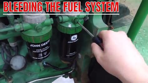 bleeding john deere 317 skid steer fuel system|john deere bleeding system.